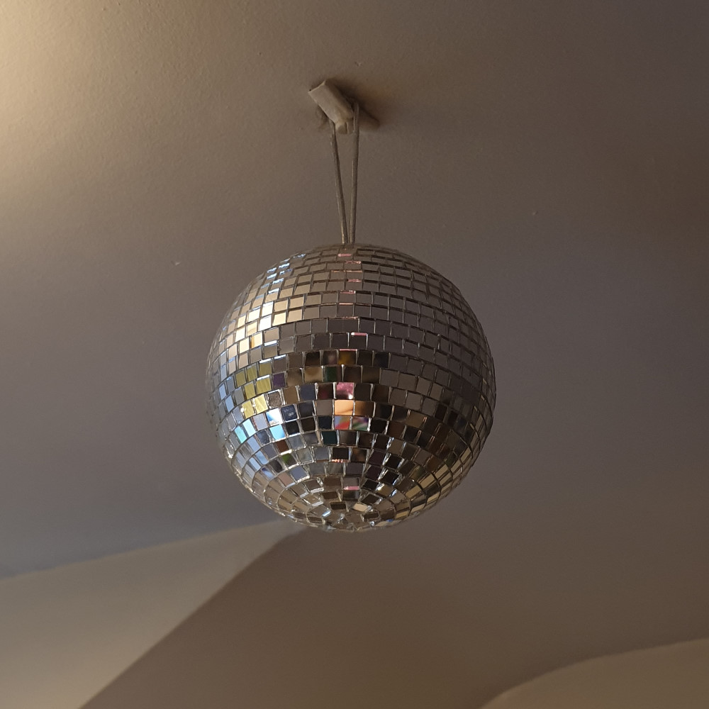 A mirror ball hanging from the ceiling